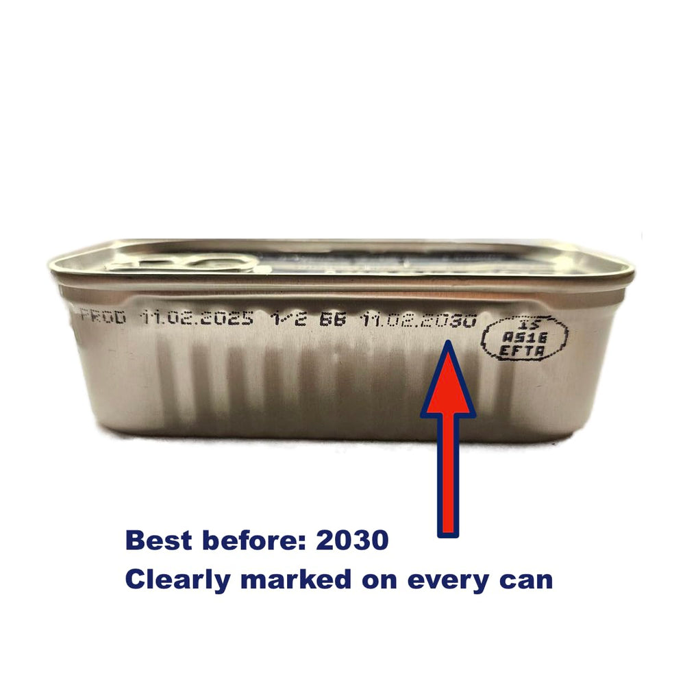 DOMA cod liver next to measuring spoon showing portion and scale clarity