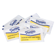 Domino packets loaded in a countertop dispenser for quick access benefit