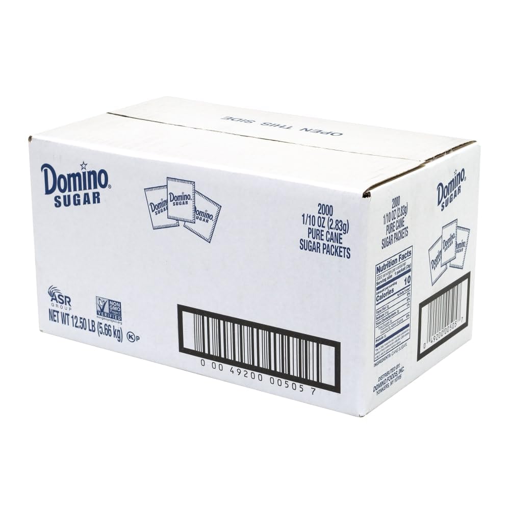 Domino single packet in hand demonstrating portable convenience for travel
