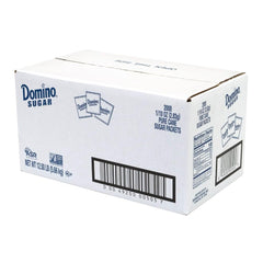 Domino single packet in hand demonstrating portable convenience for travel