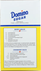 Domino granulated sugar pouring to show texture and even measuring for recipes