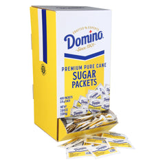Domino front packaging showing 400-count dispenser box, tidy storage benefit