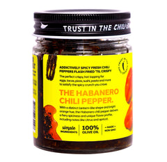 Don Chilio jar with spoon showing easy serving and oil sheen