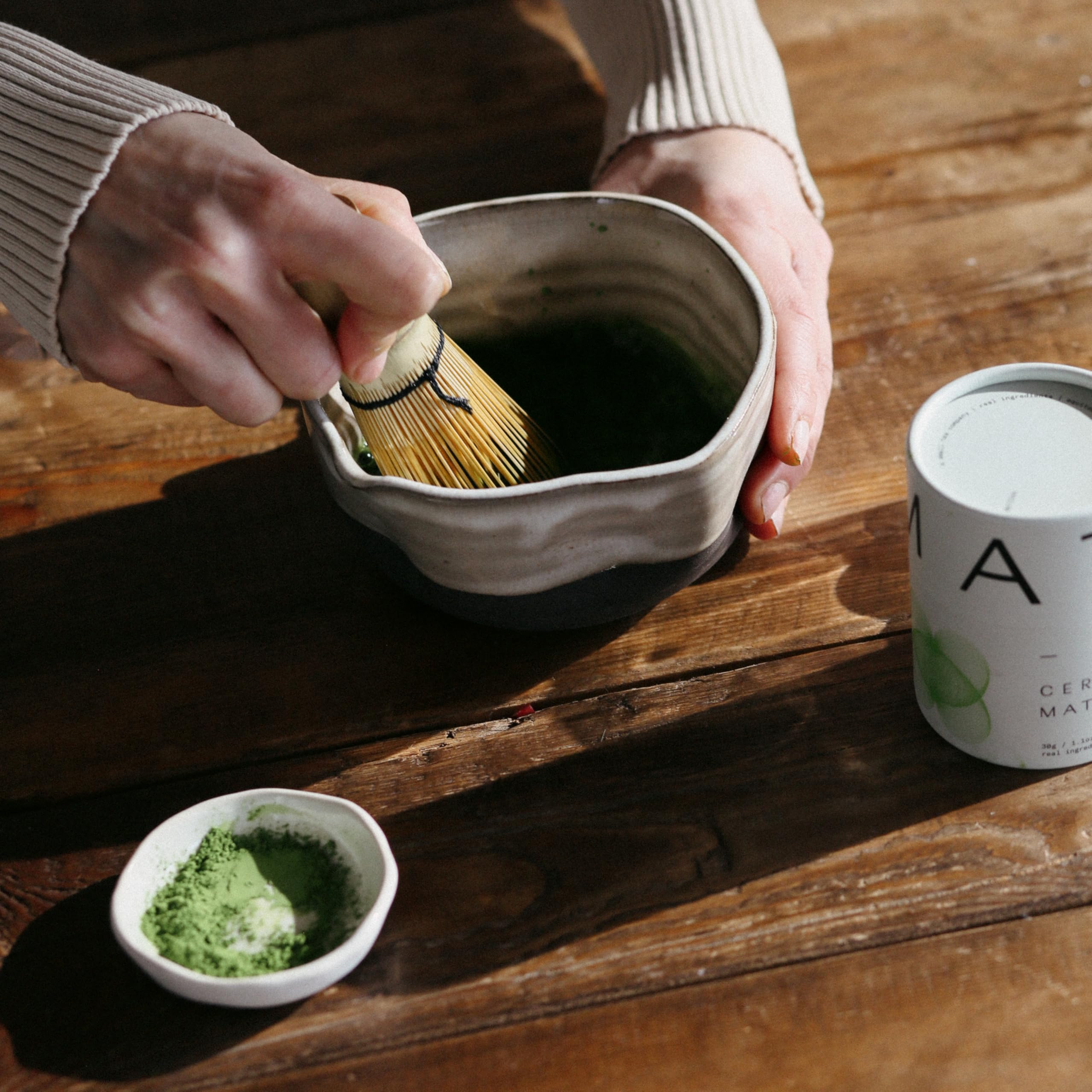 Dona Chai matcha latte in glass demonstrating creamy froth and versatile use