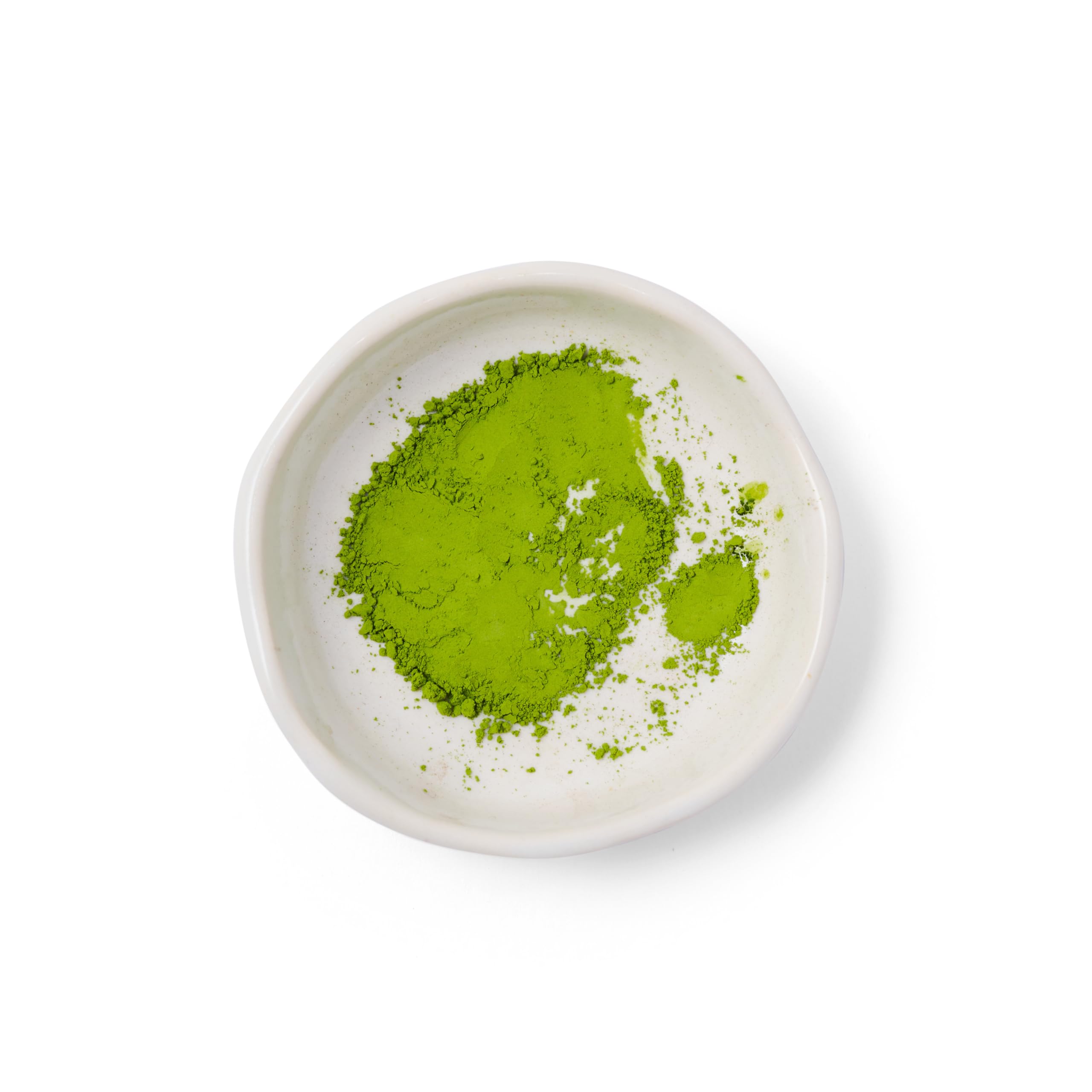 Dona Chai whisked matcha bowl producing froth for smooth traditional drinking