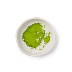 Dona Chai whisked matcha bowl producing froth for smooth traditional drinking