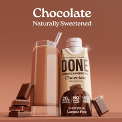 Done chocolate bottle in hand showing portable size and convenient nutrition