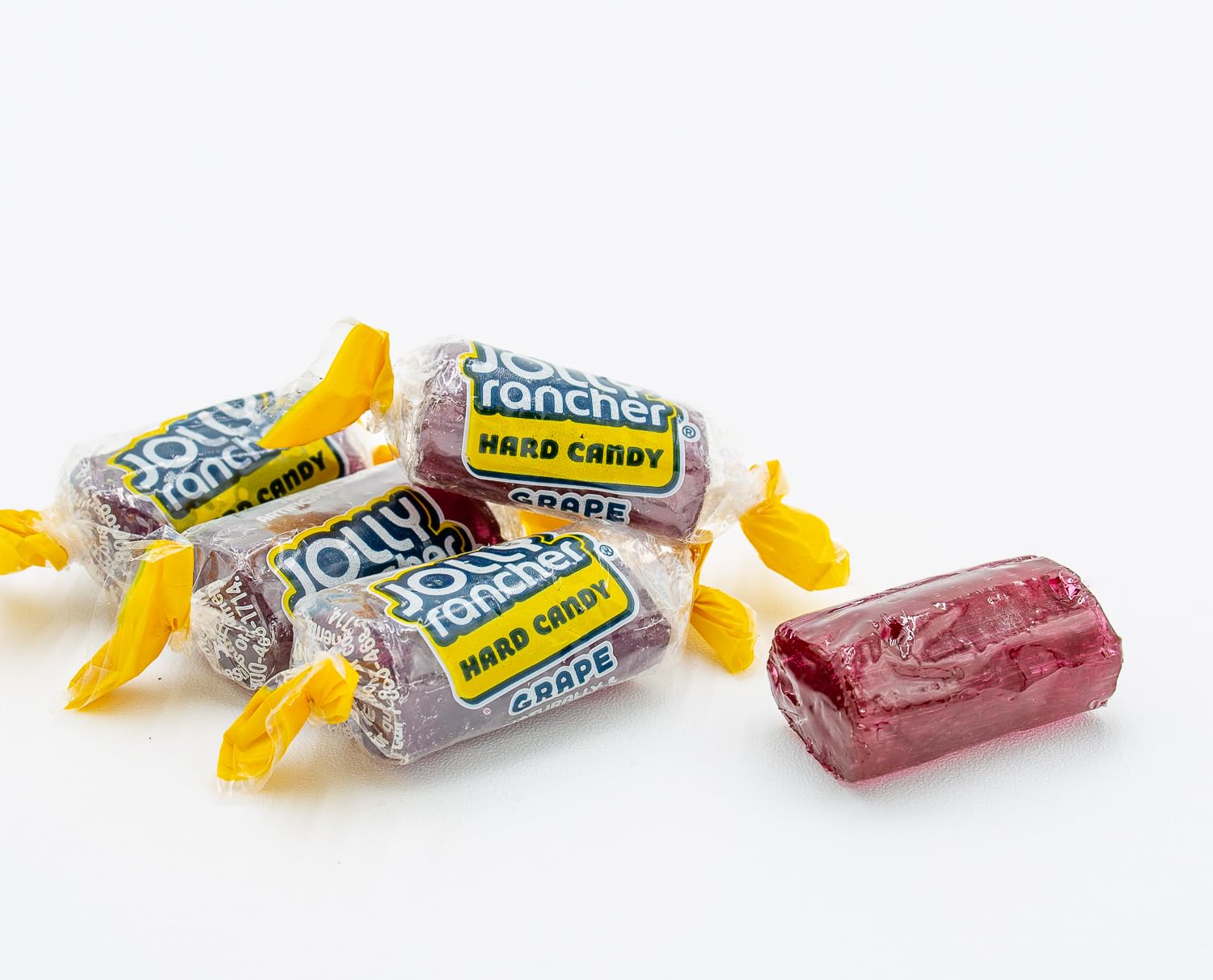 Donty-Tonty scattered grape candies showing vibrant purple color and appeal