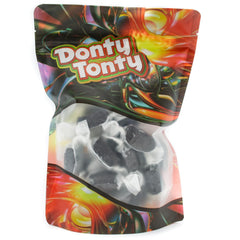 Donty-Tonty unwrapped caramel held in hand showing chewability and easy portioning