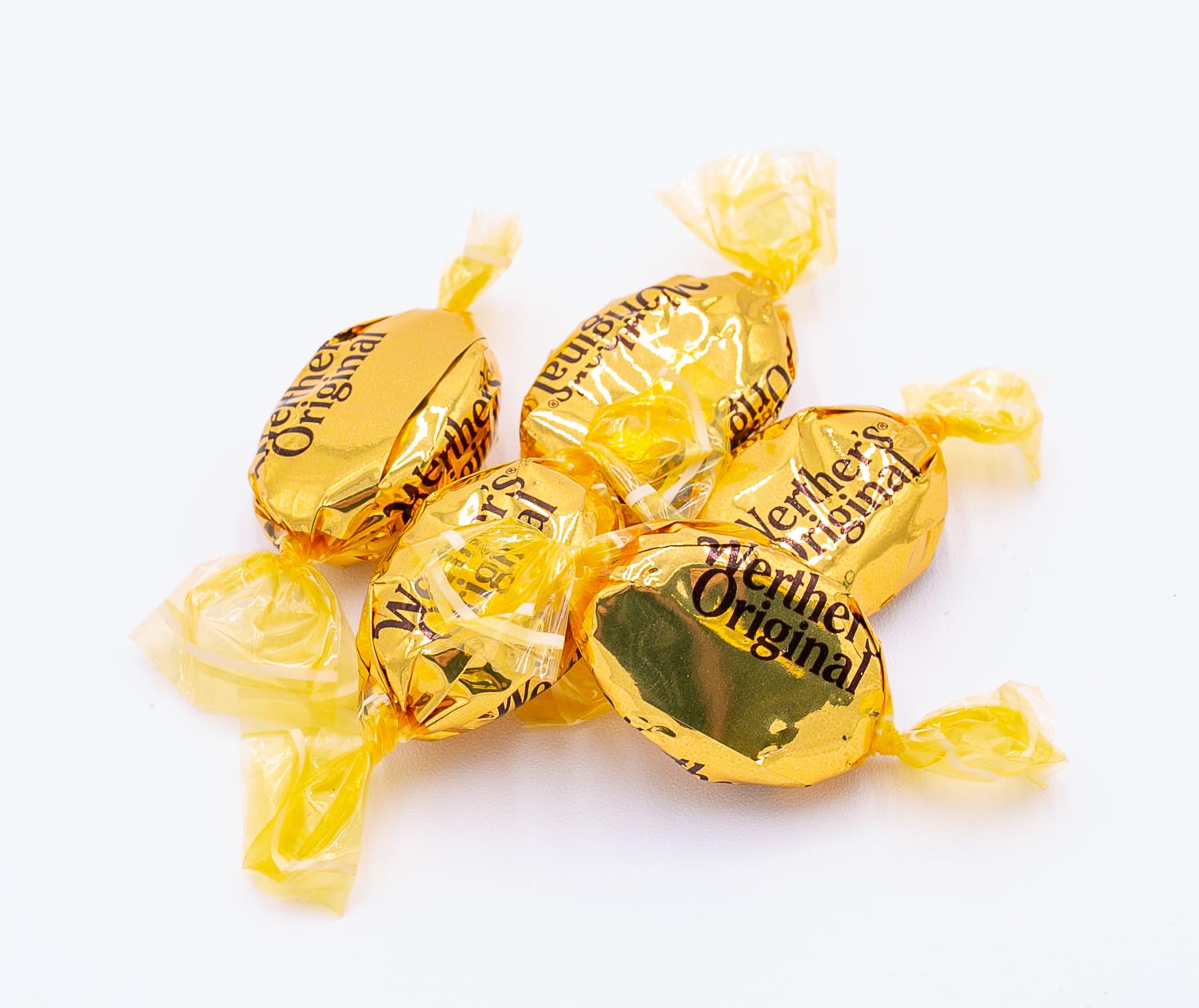 Donty-Tonty candy beside a coin for scale to show generous size and portion