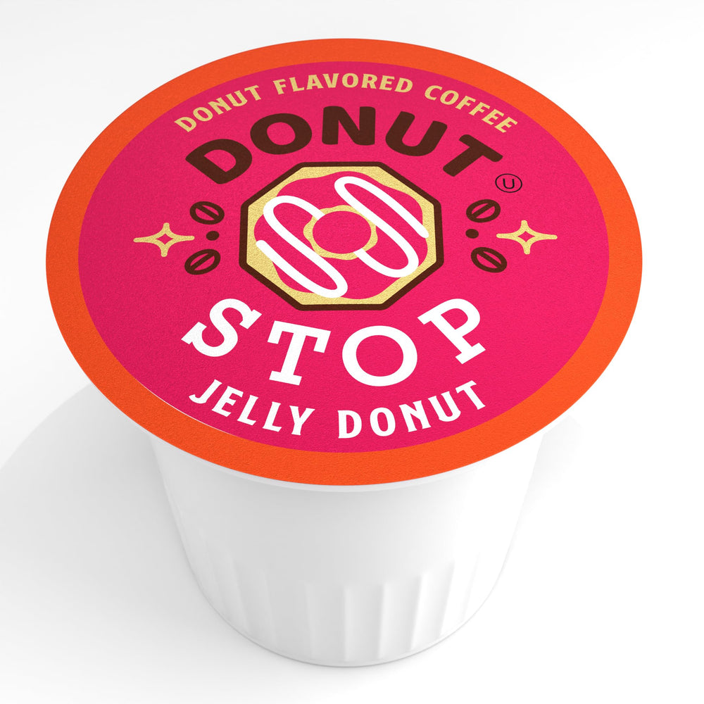 Brewed cup from Donut Stop pods showing raspberry-infused crema and inviting aroma