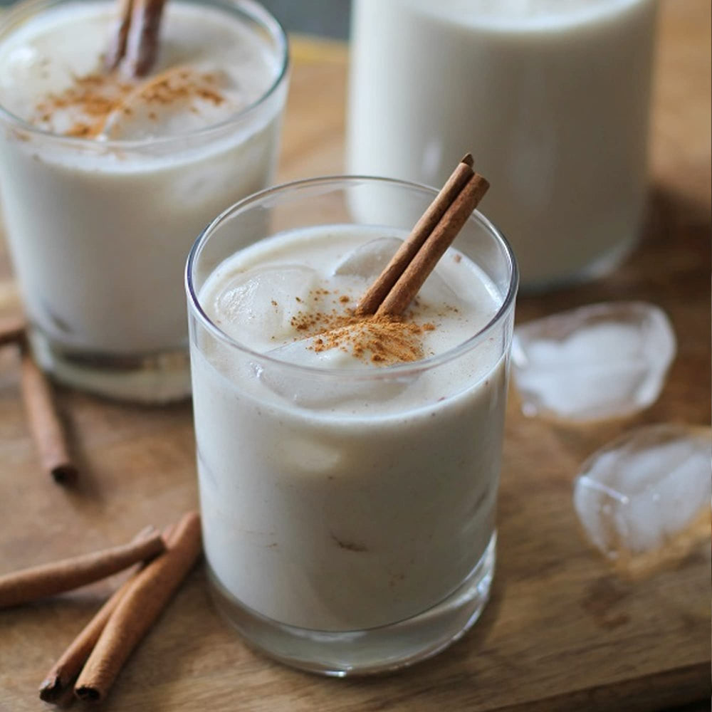 Creamy chai latte poured into cup with foam, Double Donut branding and comforting appeal