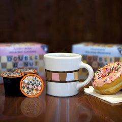 Double Donut brewed decaf cup closeup showing crema and smooth medium roast