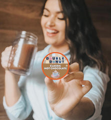 Brewed cup of Double Donut hot chocolate in ceramic mug, creamy classic cocoa served hot