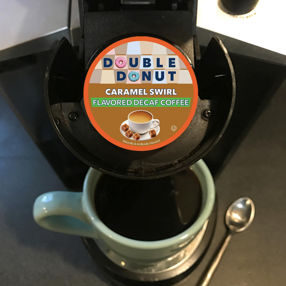 Hand holding a Double Donut pod to show compact size and single-serve ease