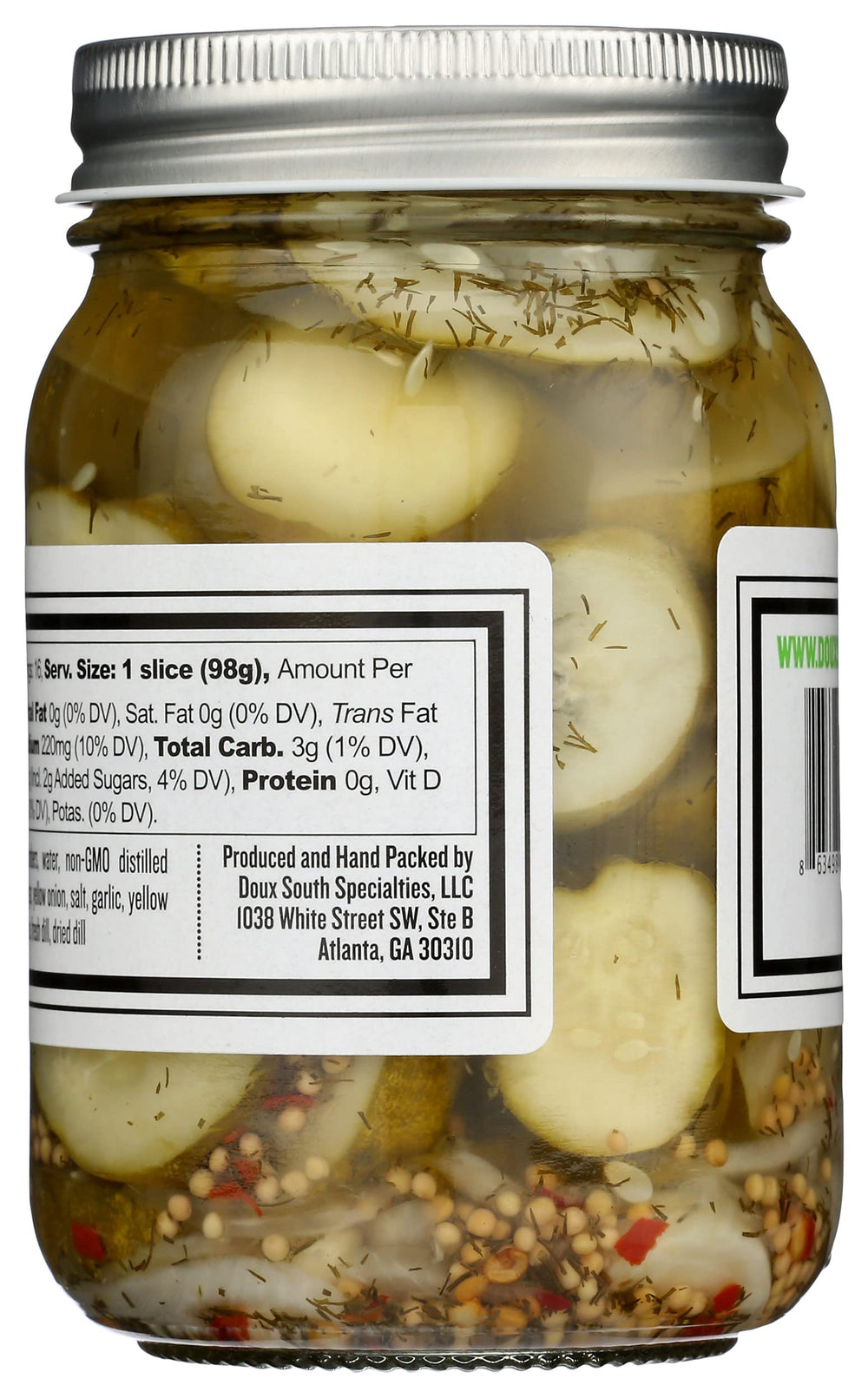 Close-up of Doux South jar glass and brine, showing crunchy pickles inside for texture detail