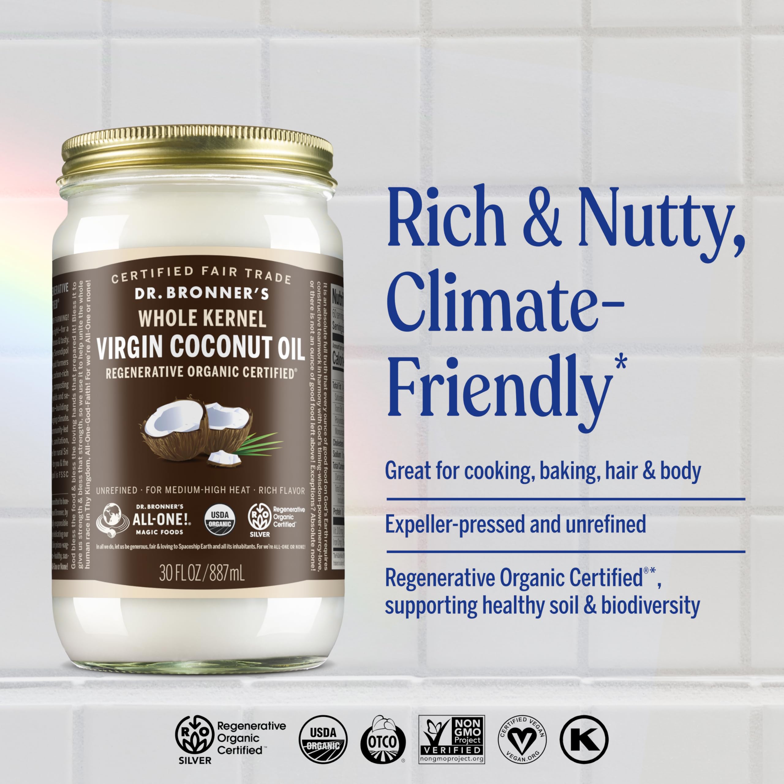Dr. Bronner's whole kernel coconut oil open jar showing smooth unrefined texture benefit
