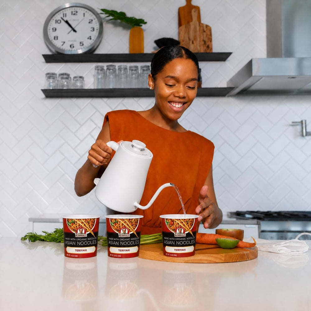 Dr. McDougall's teriyaki sauce pouring over noodles showing rich flavor benefit