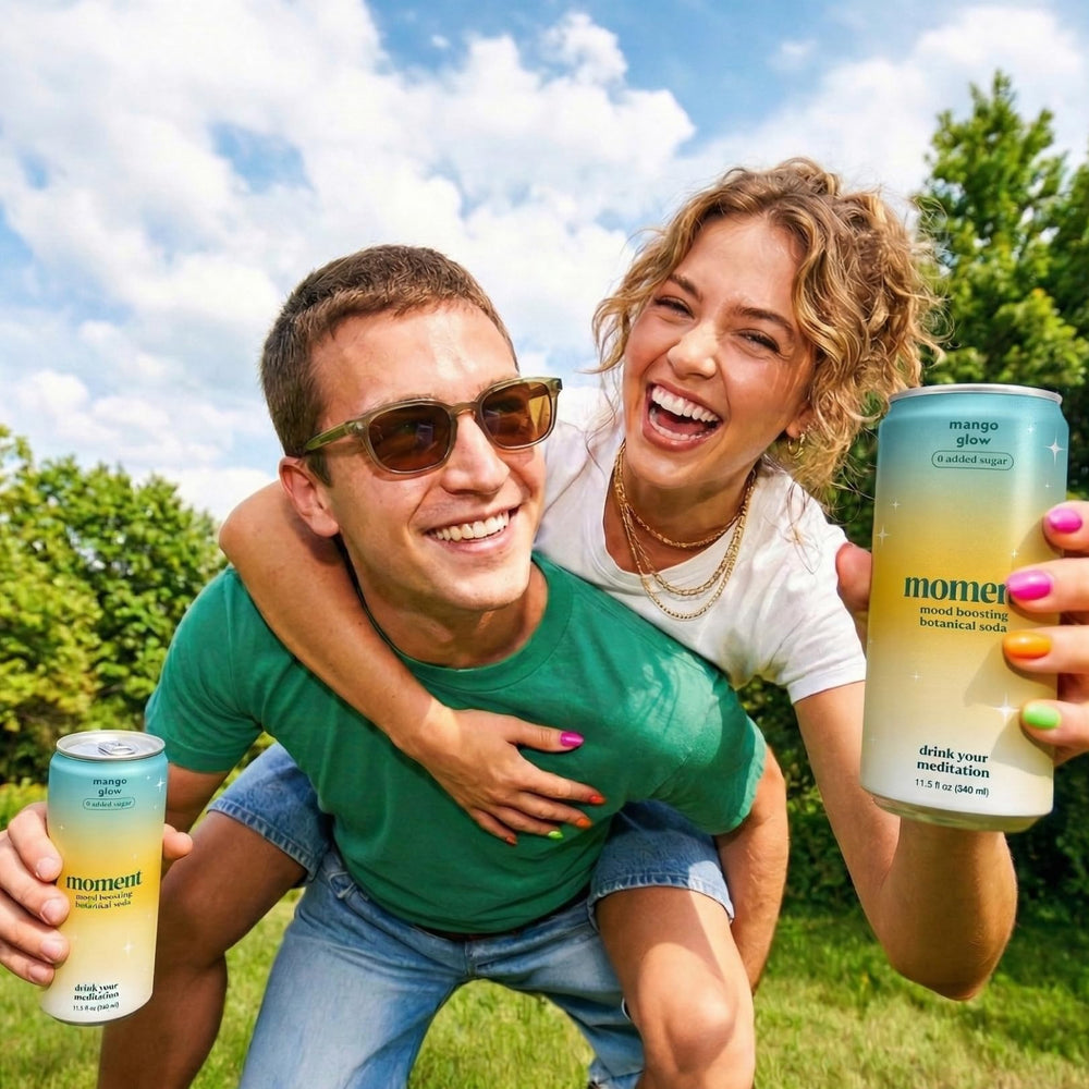 Drink Your Meditation can held in hand to show 11.5 fl oz size and easy portability
