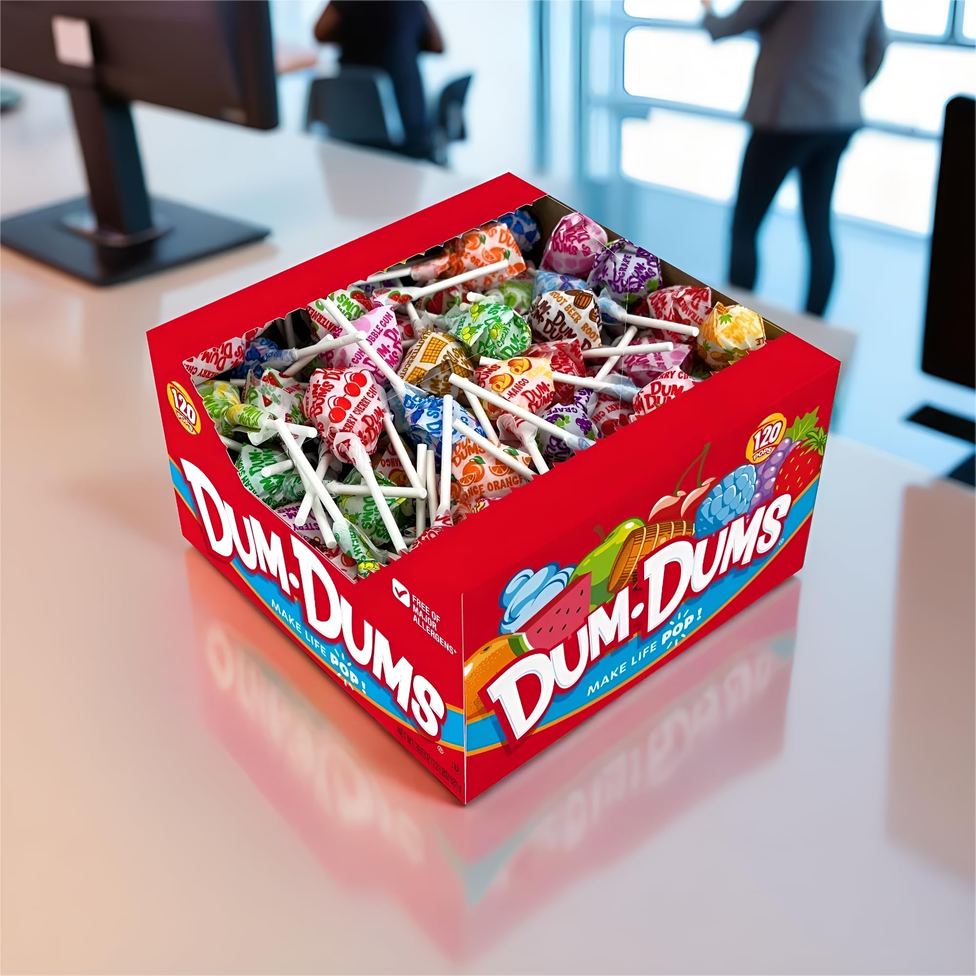 Dum Dums assorted suckers in a clear candy jar for attractive countertop display