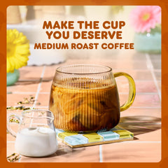 Dunkin' brewed butter pecan coffee in cup highlighting creamy appearance