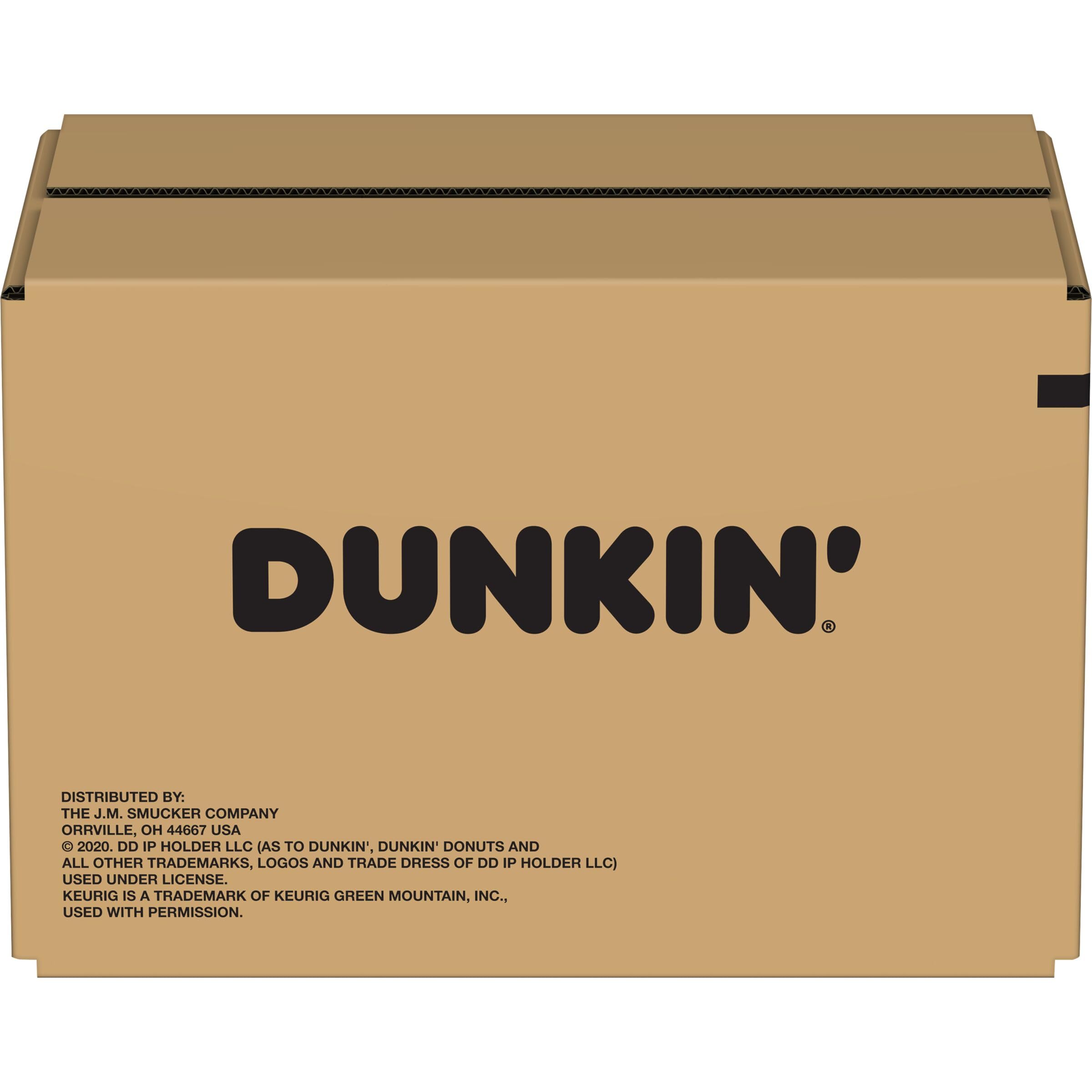 Dunkin' cup beside breakfast plate showing everyday mealtime pairing