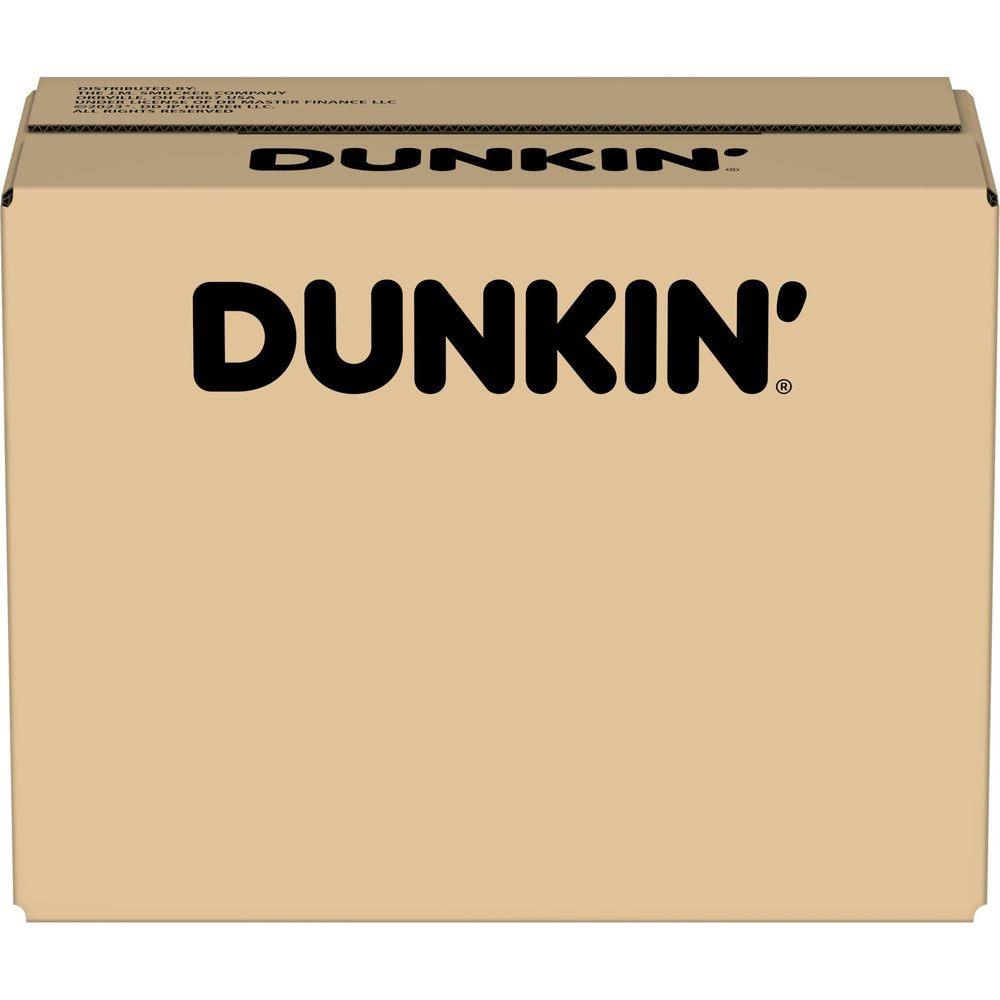 Eighteen-ounce bag of Dunkin’ decaf beside common kitchen items for scale