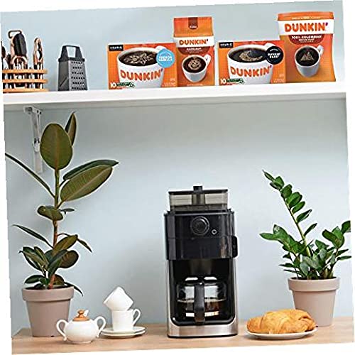 Hand holding a Dunkin' pod illustrating size and single-serve convenience