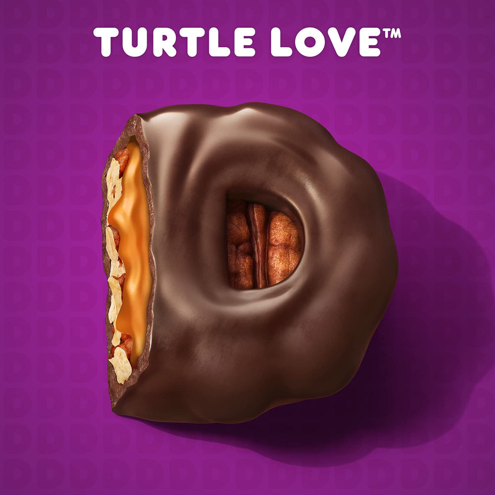 Dunkin' ingredients styled shot with caramel pecans and chocolate suggesting taste notes