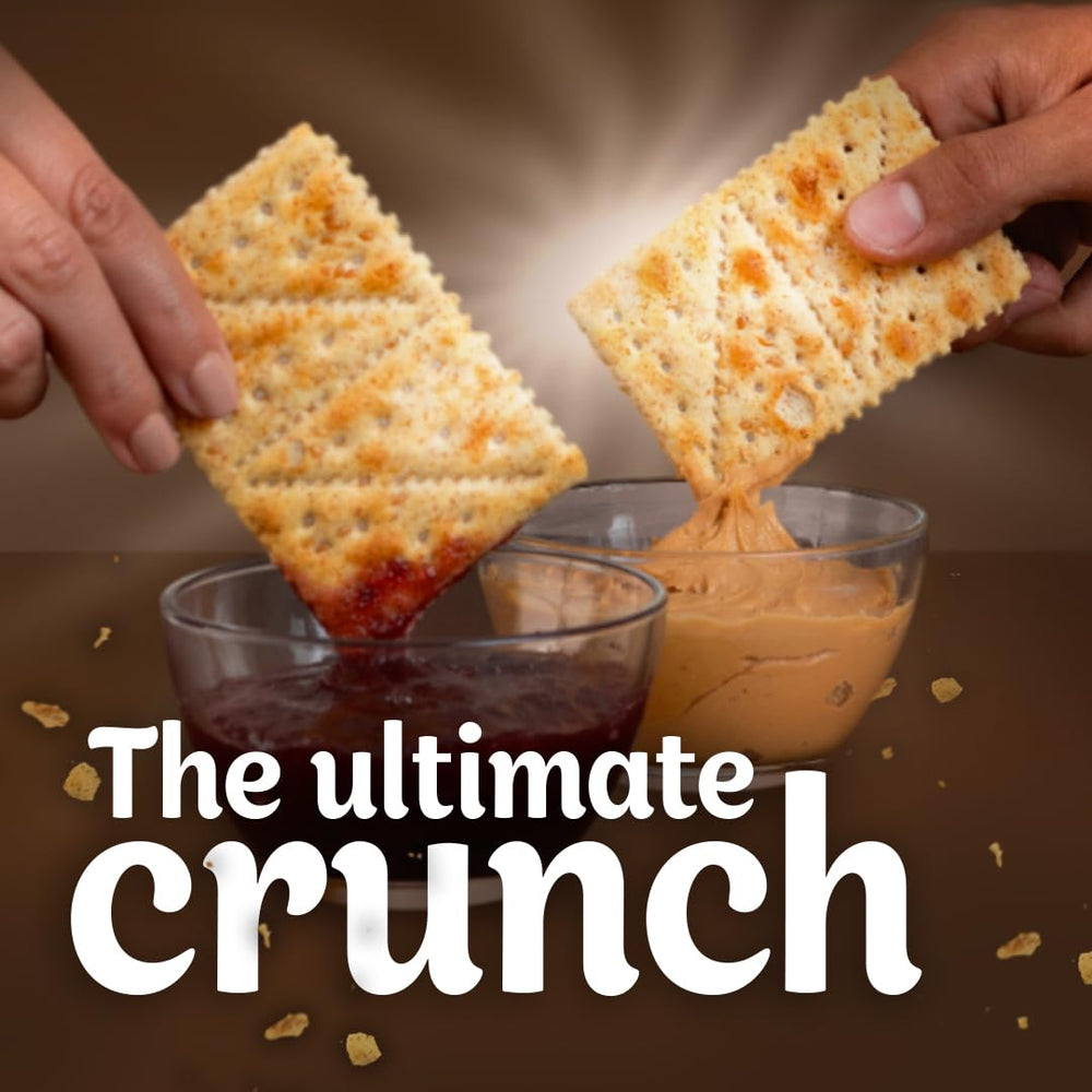 DUX crackers held in hand to show size and portion clarity