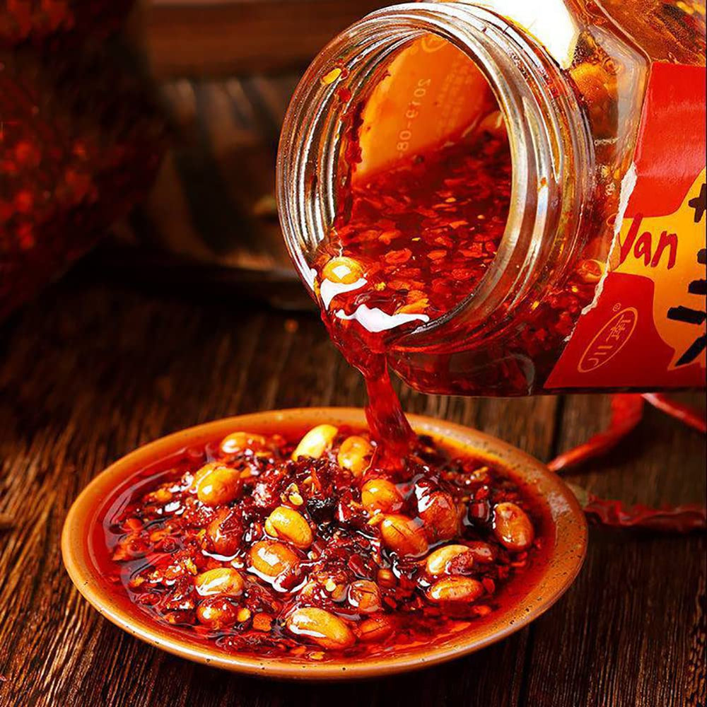 EAPC ingredients display with roasted chili, peanuts and rapeseed oil showing natural components and quality