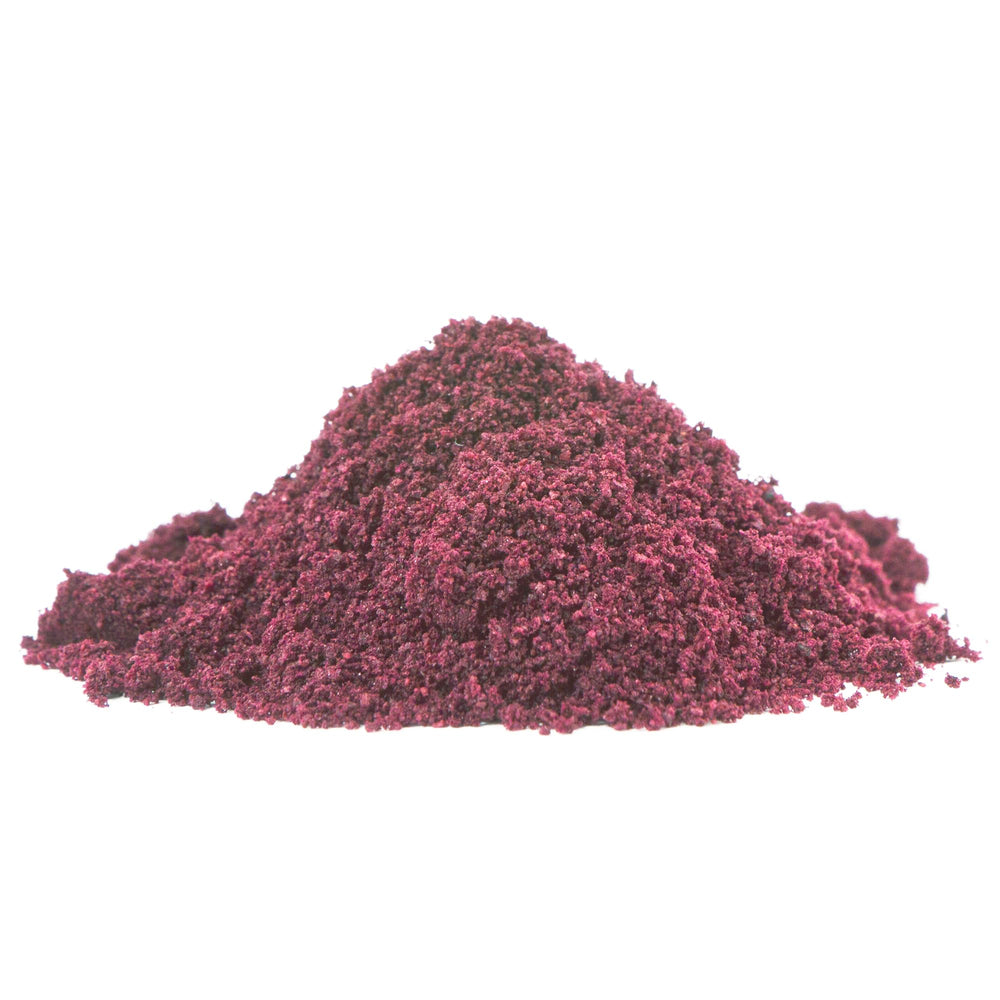 Earthborn Elements açaí smoothie bowl topped with fruit showing vibrant color and appeal