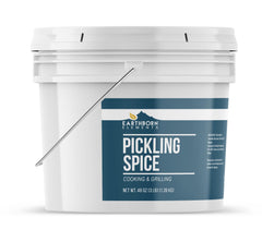 Earthborn Elements pickling spice used during canning showing ease of bulk dispensing