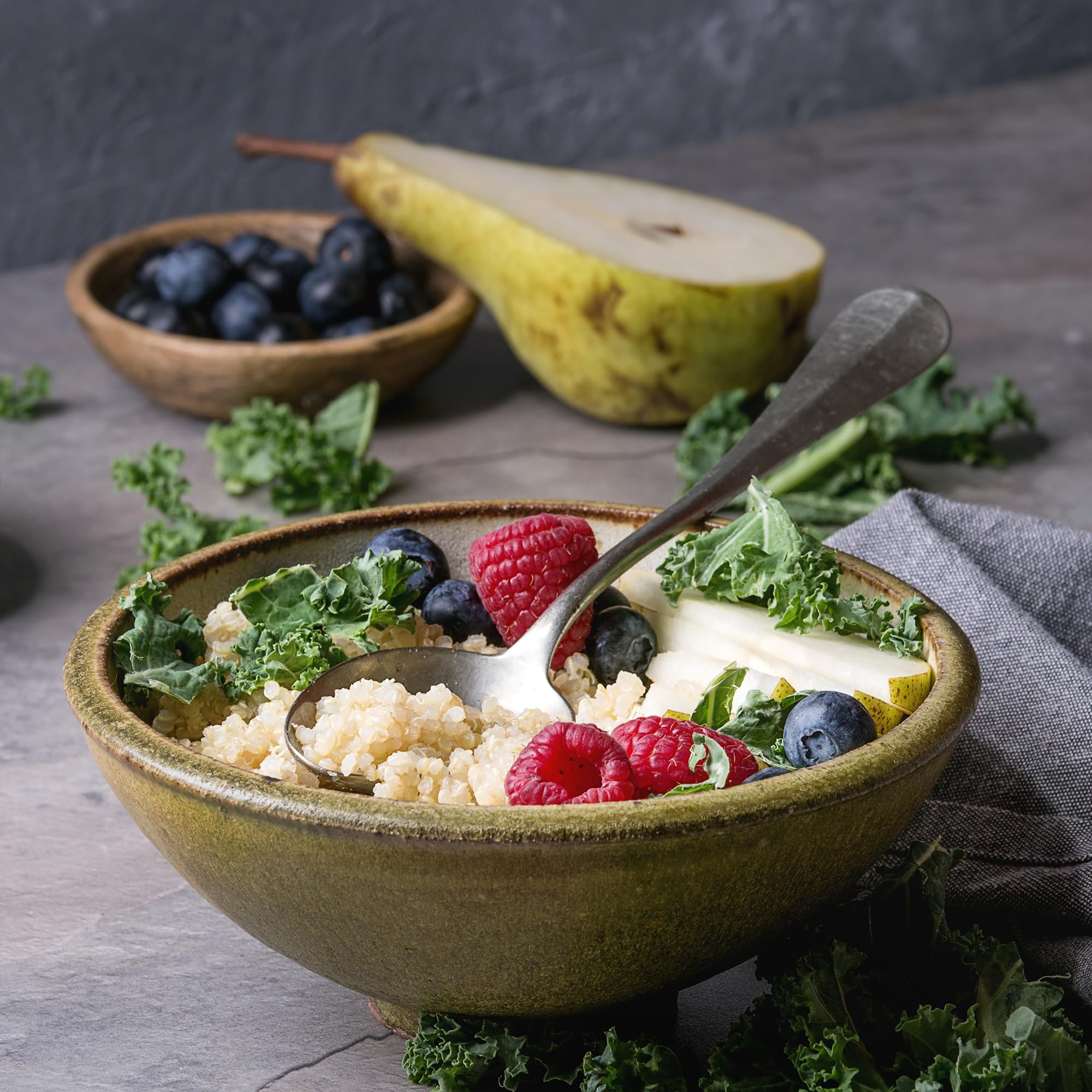 Earthborn Elements cooked quinoa in bowl illustrating fluffy texture and meal readiness