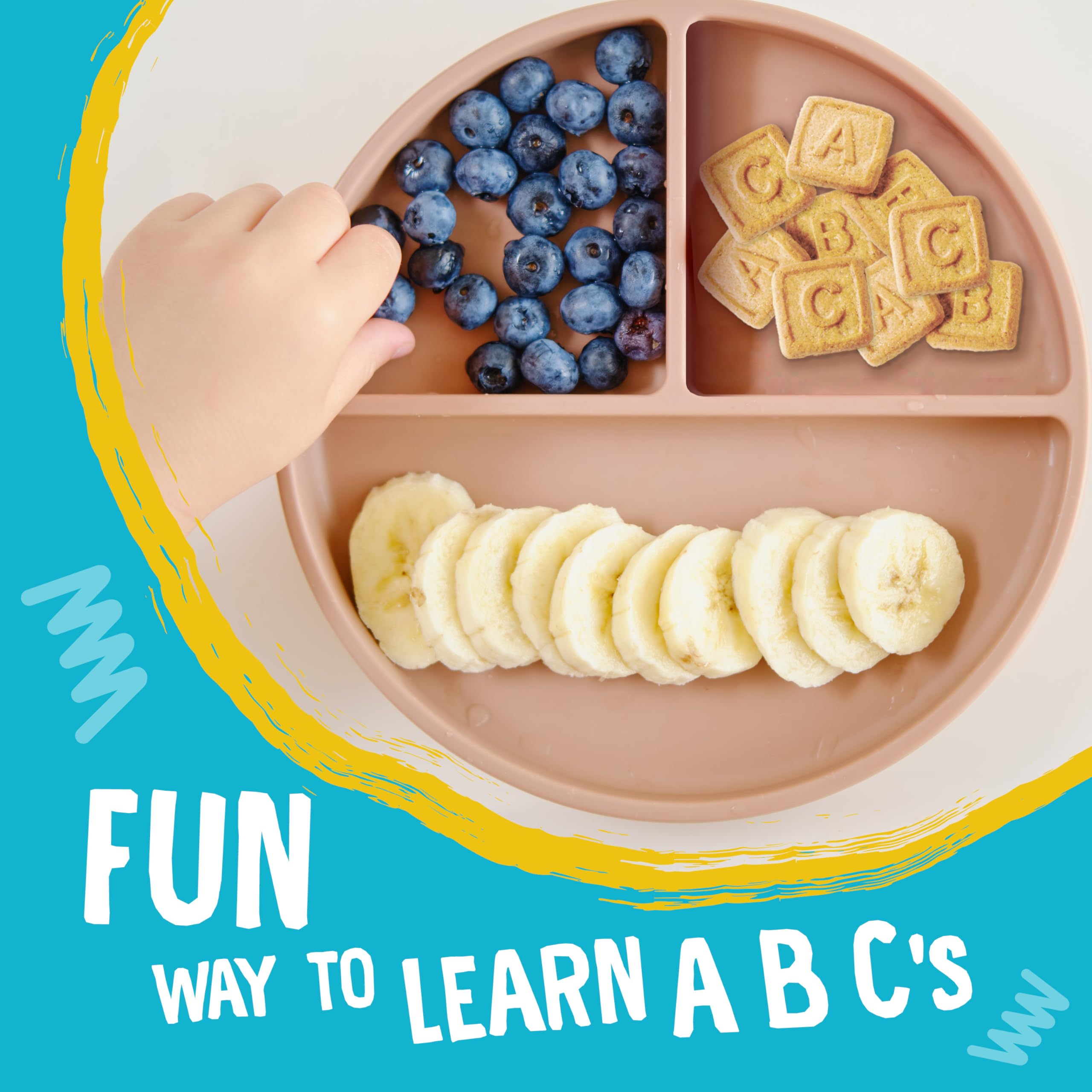 Earth's Best cookie in toddler hand showing easy grip and kid-friendly size
