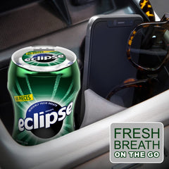 eclipse spearmint bottle placed in car cupholder for convenient on-the-go freshness