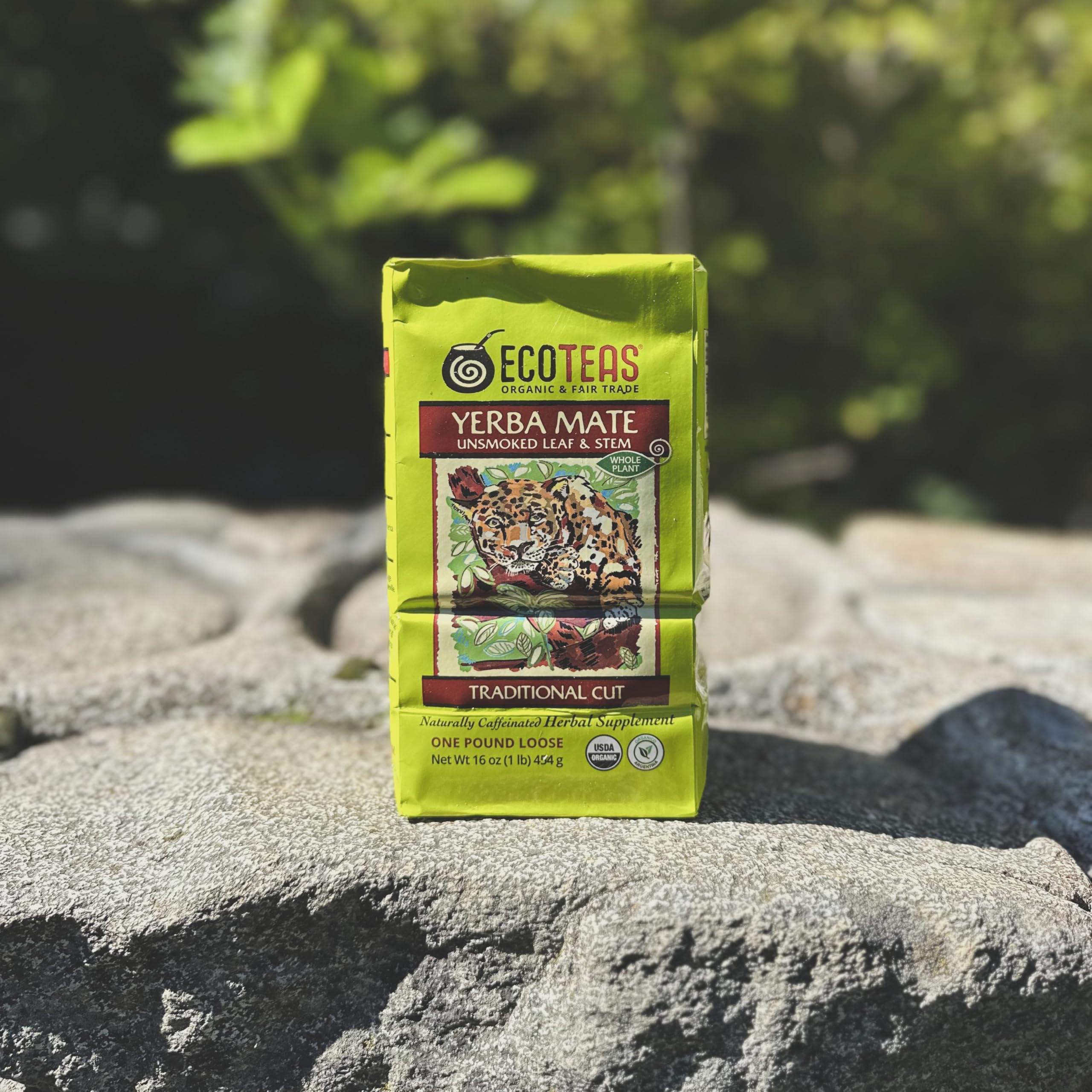 ECOTEAS one-pound bag next to a coffee mug for clear size and portion comparison