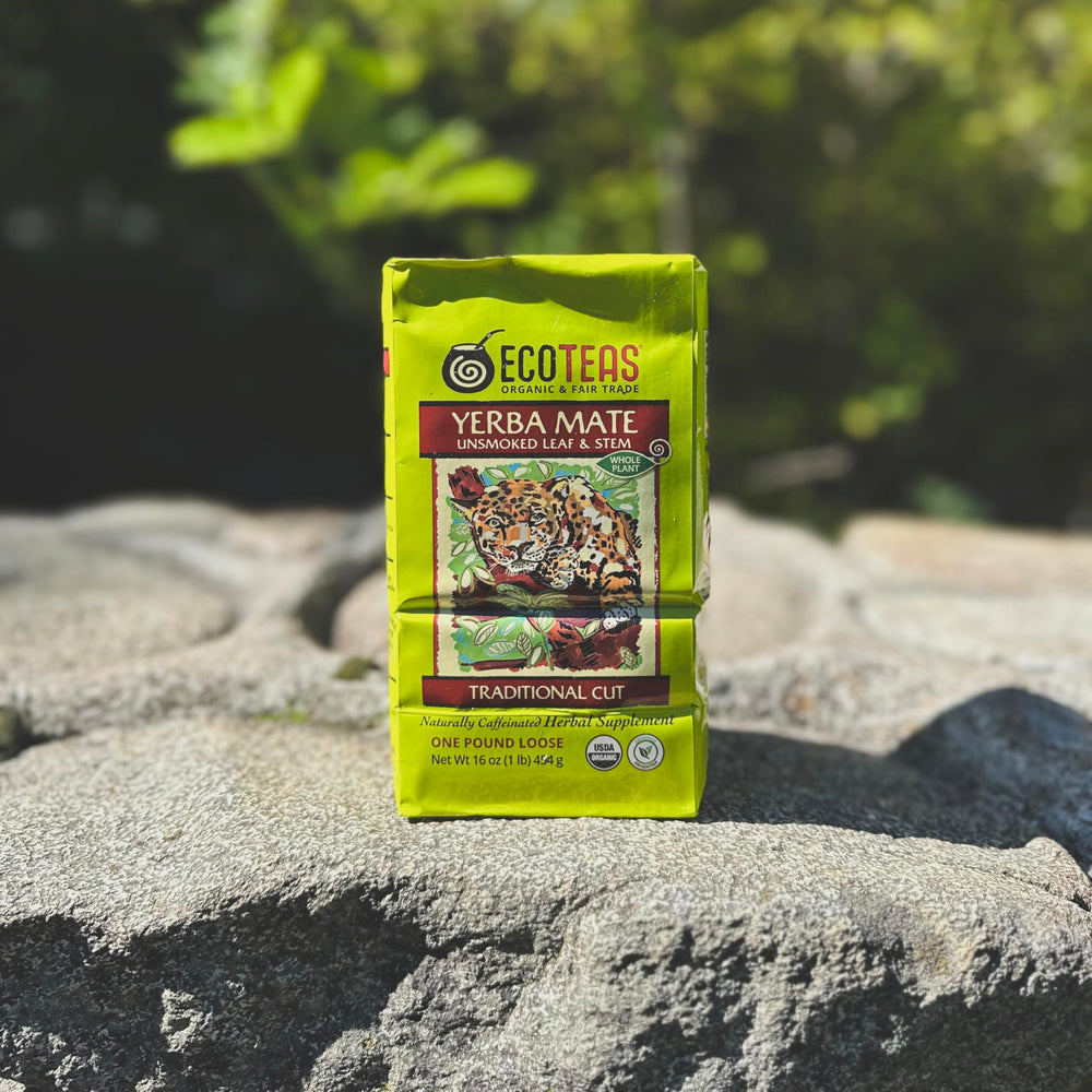 ECOTEAS one-pound bag next to a coffee mug for clear size and portion comparison