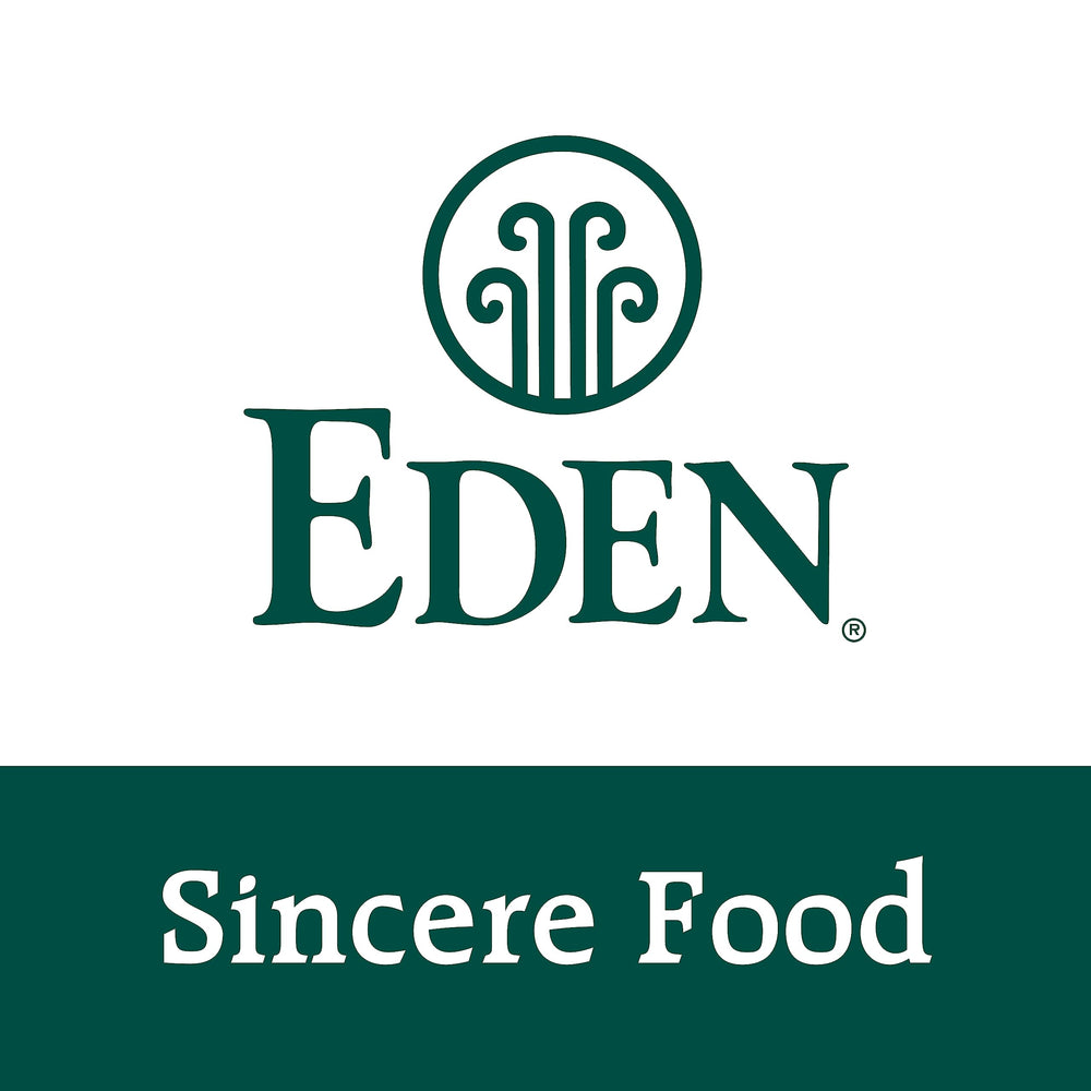 Eden Organic in kitchen prep with chef adding miso for flavor boost