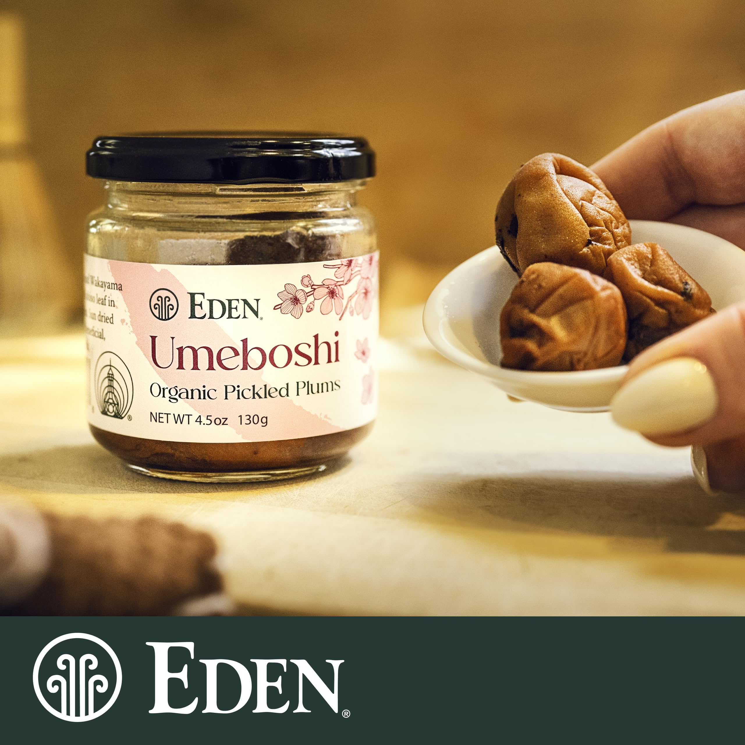 CREATION AND MAINTENANCE OF PURITY IN FOOD umeboshi placed inside a rice ball adding bright savory acidity
