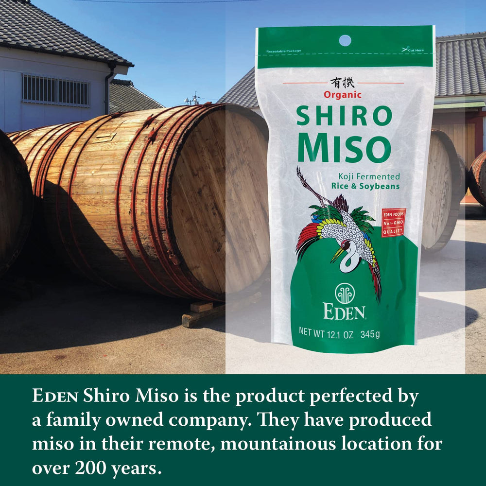 Eden Shiro miso on a spoon ready to add to soup, providing gentle umami flavor