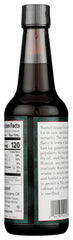 CREATION AND MAINTENANCE OF PURITY IN FOOD pouring oil over steamed vegetables to add rich toasted aroma