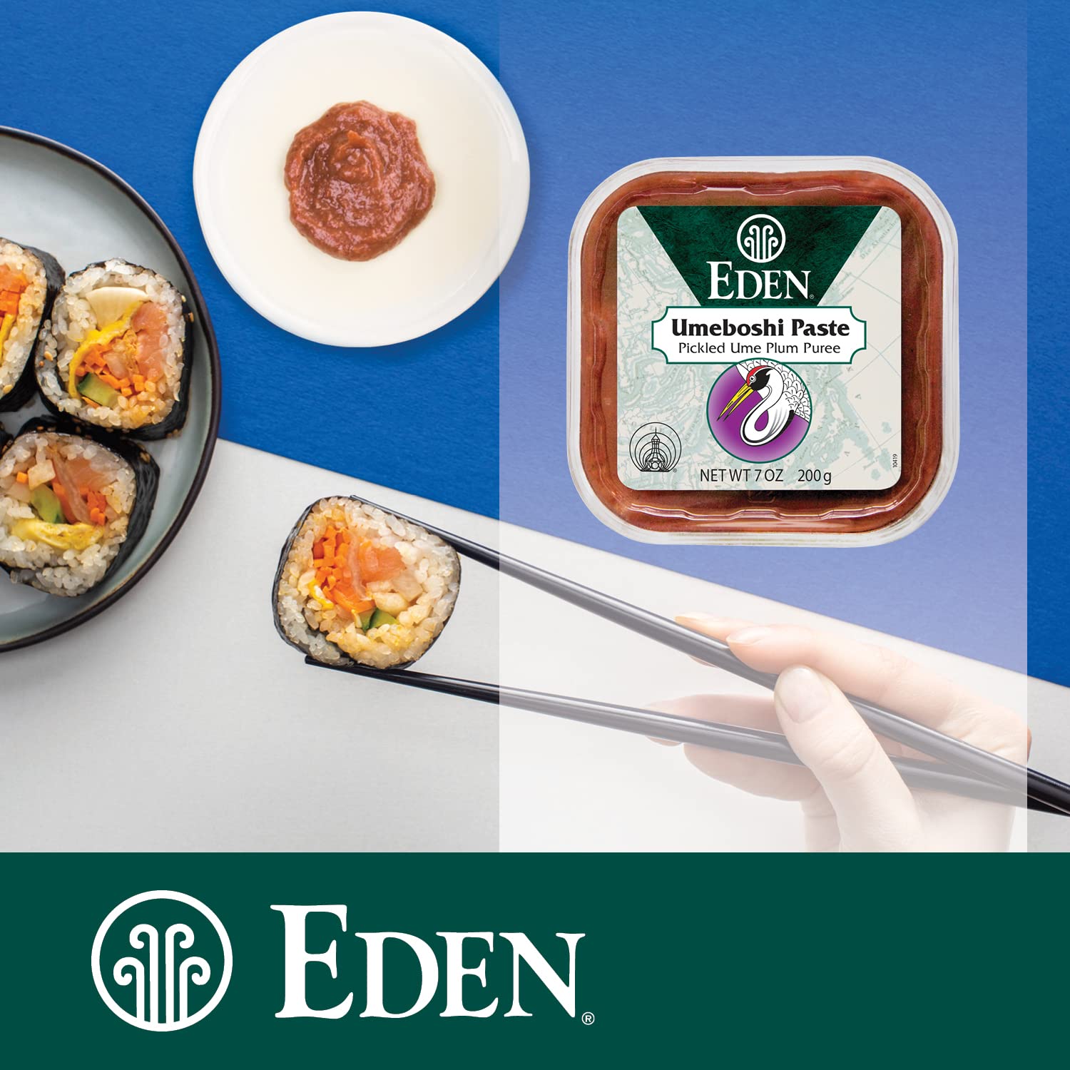 Eden umeboshi jar held in hand for scale, illustrates compact 7 oz serving