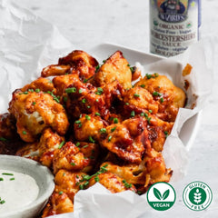Edward & Sons sauce pouring over vegetables to add savory depth and rich flavor