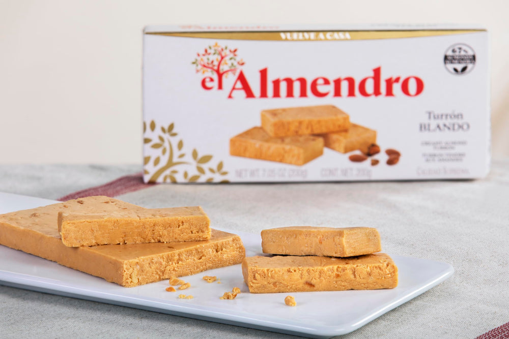 El Almendro jar open with creamy almond turron visible and easy spreading benefit