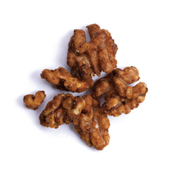 Close-up of coated walnuts with chia seeds highlighting texture and Elan brand appeal