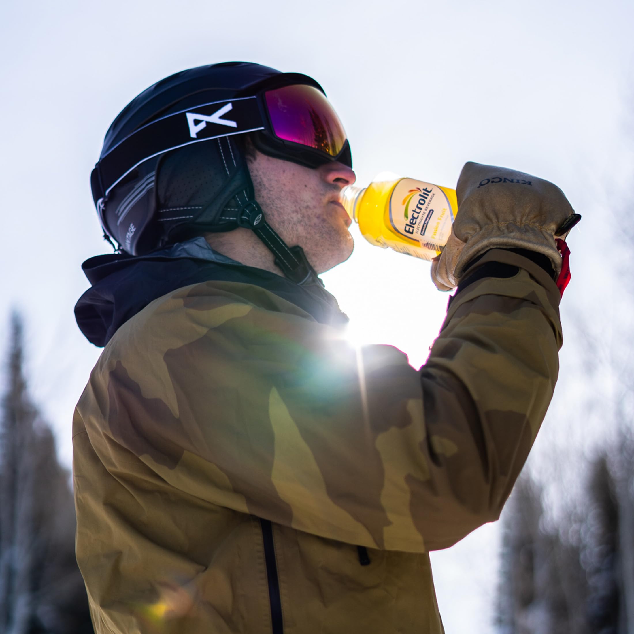 Open Electrolit bottle with liquid visible demonstrating thirst-quenching refreshment