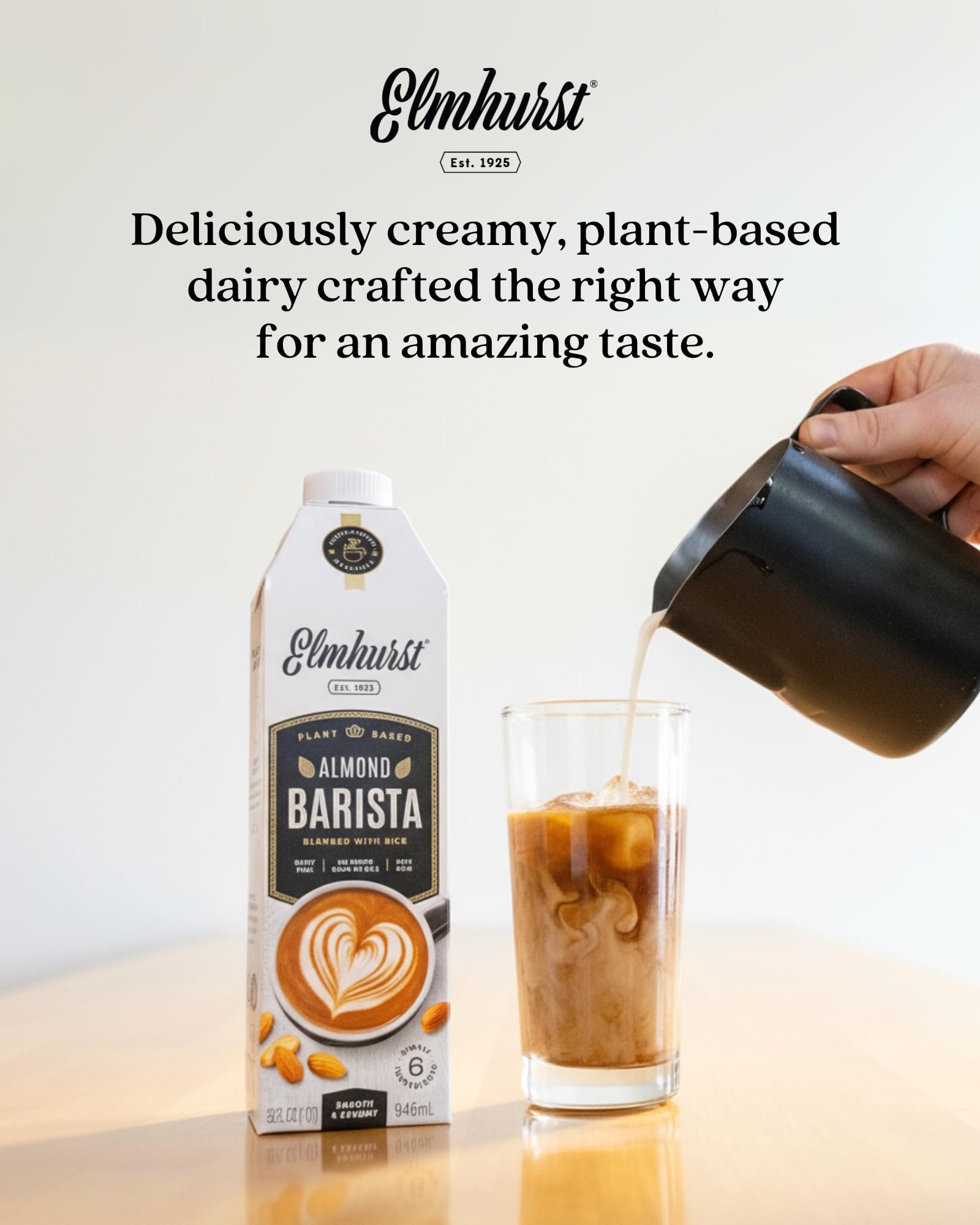 Elmhurst almond milk next to a 32 oz bottle for scale and serving convenience