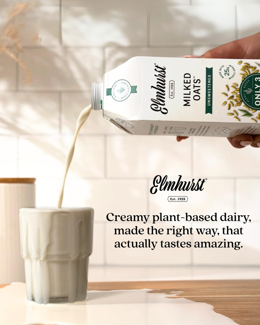Elmhurst oat milk poured into coffee showing froth and barista-friendly benefit