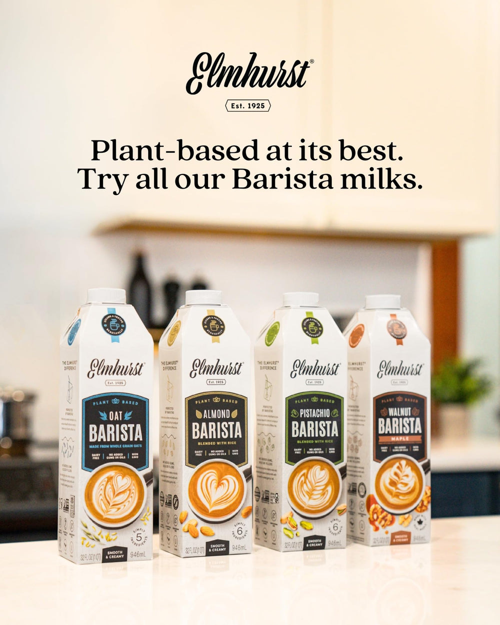 Elmhurst oat milk next to a cappuccino on kitchen counter showing café-quality results benefit